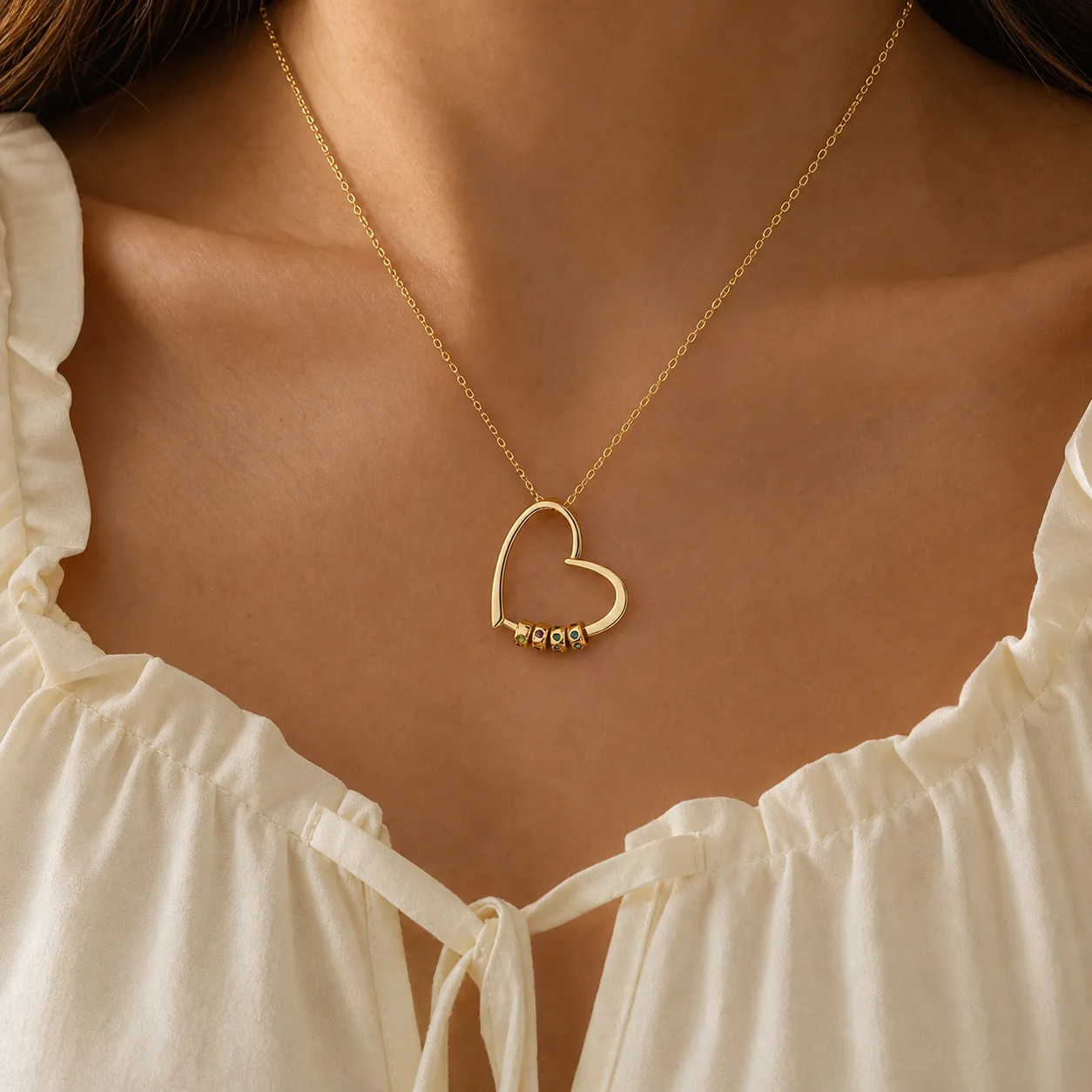 Gathered Hearts Name Necklace worn at the neckline