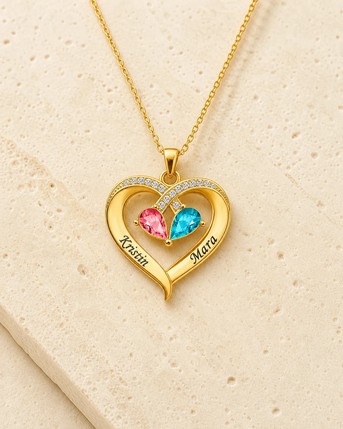 Gold tone Two-Tone Teardrop Story Necklace with two engraved names and two teardrop birthstones